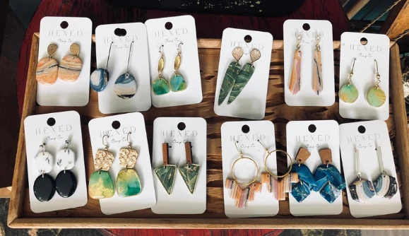 A display of earrings made by the Hexed Clay Company in Bangor ME