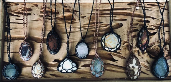 11 Macrame necklaces, containing stones of various shapes and colors